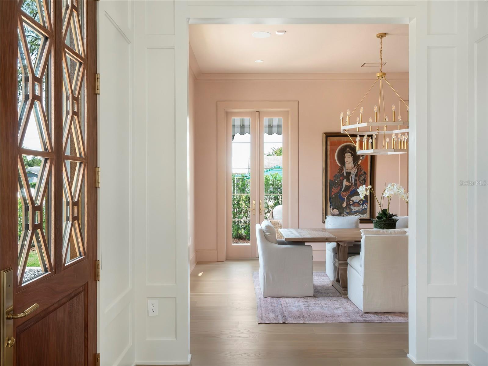 Entry foyer with carved wood door